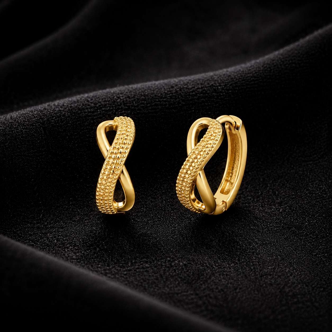 Gold Tone Infinity Twist Huggie Earrings